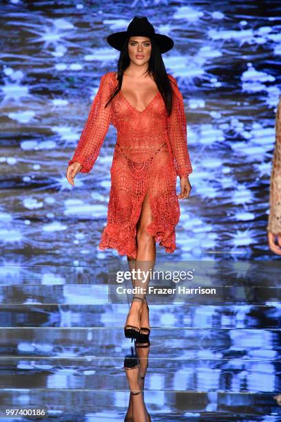 Model walks the runway for Baes & Bikinis during the Paraiso Fashion Fair at The Paraiso Tent on July 12, 2018 in Miami Beach, Florida.