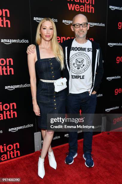 Julie Mintz and Moby attend the premiere of Amazon Studios' "Generation Wealth" at ArcLight Hollywood on July 12, 2018 in Hollywood, California.