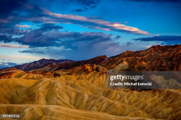 sunset over zabriskie point - sunset point stock pictures, royalty-free photos & images