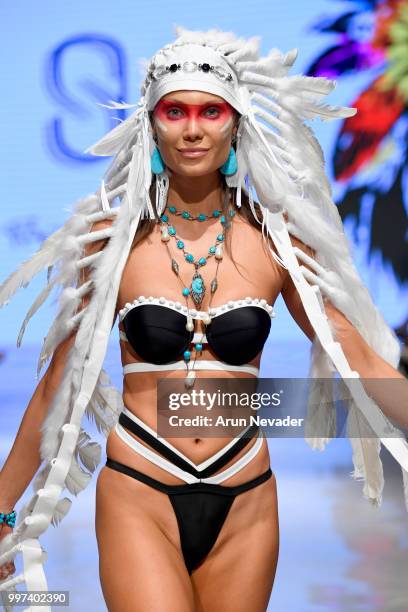 Model walks the runway for Silvia Ulson at Miami Swim Week powered by Art Hearts Fashion Swim/Resort 2018/19 at Faena Forum on July 12, 2018 in Miami...