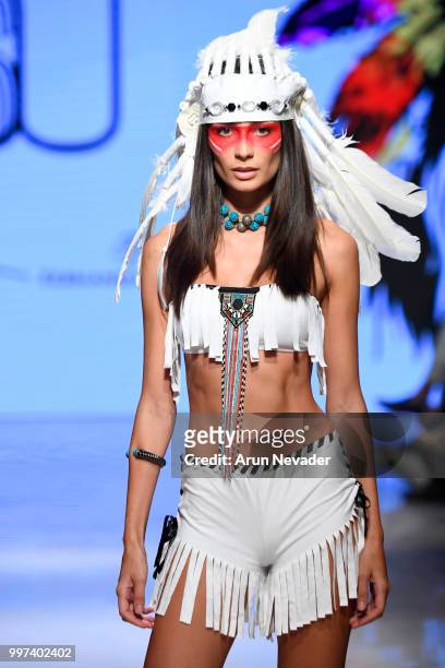 Model walks the runway for Silvia Ulson at Miami Swim Week powered by Art Hearts Fashion Swim/Resort 2018/19 at Faena Forum on July 12, 2018 in Miami...
