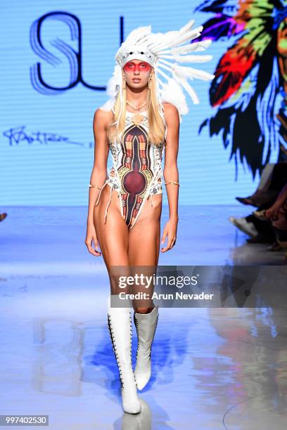 Model walks the runway for Silvia Ulson at Miami Swim Week powered by Art Hearts Fashion Swim/Resort 2018/19 at Faena Forum on July 12, 2018 in Miami...