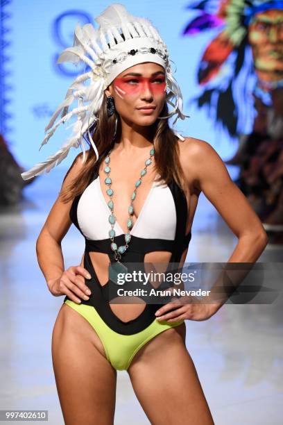 Model walks the runway for Silvia Ulson at Miami Swim Week powered by Art Hearts Fashion Swim/Resort 2018/19 at Faena Forum on July 12, 2018 in Miami...