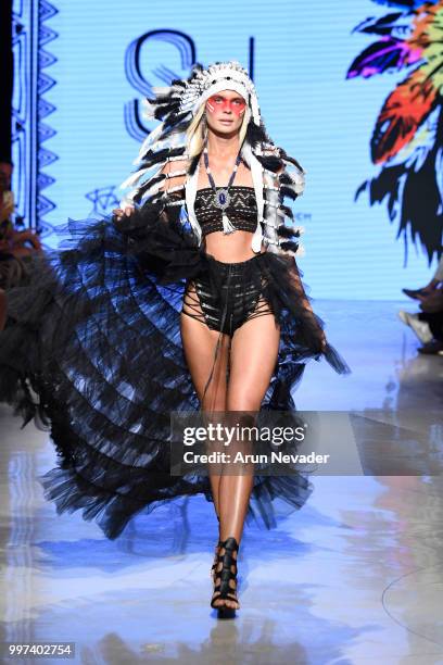 Model walks the runway for Silvia Ulson at Miami Swim Week powered by Art Hearts Fashion Swim/Resort 2018/19 at Faena Forum on July 12, 2018 in Miami...