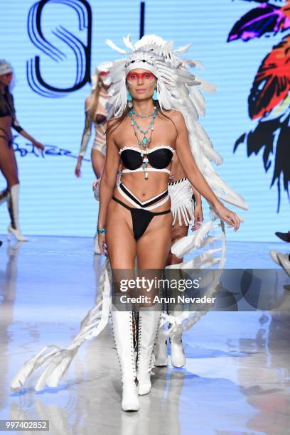 Models walk the runway for Silvia Ulson at Miami Swim Week powered by Art Hearts Fashion Swim/Resort 2018/19 at Faena Forum on July 12, 2018 in Miami...