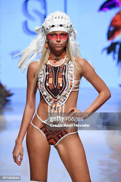 Model walks the runway for Silvia Ulson at Miami Swim Week powered by Art Hearts Fashion Swim/Resort 2018/19 at Faena Forum on July 12, 2018 in Miami...