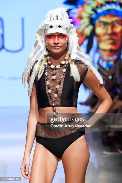 Model walks the runway for Silvia Ulson at Miami Swim Week powered by Art Hearts Fashion Swim/Resort 2018/19 at Faena Forum on July 12, 2018 in Miami...