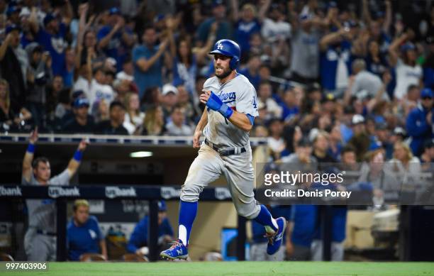 Chris Taylor of the Los Angeles Dodgers runs as he scores during the seventh inning of a baseball game against the San Diego Padres at PETCO Park on...