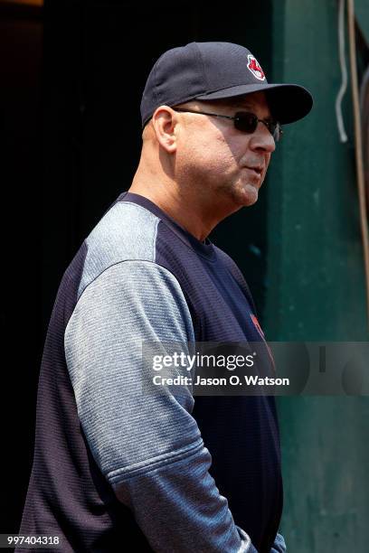 Terry Francona of the Cleveland Indians stands in the dugout before the game against the Oakland Athletics at the Oakland Coliseum on July 1, 2018 in...