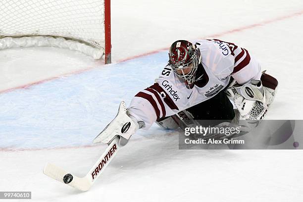 Goalkeeper Edgars Masalskis of Latvia makes a save during the IIHF World Championship group F qualification round match between Czech Republic and...