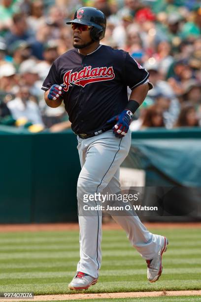 Edwin Encarnacion of the Cleveland Indians rounds the bases after hitting a home run against the Oakland Athletics during the seventh inning at the...