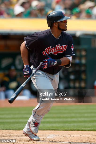 Edwin Encarnacion of the Cleveland Indians hits a home run against the Oakland Athletics during the seventh inning at the Oakland Coliseum on July 1,...
