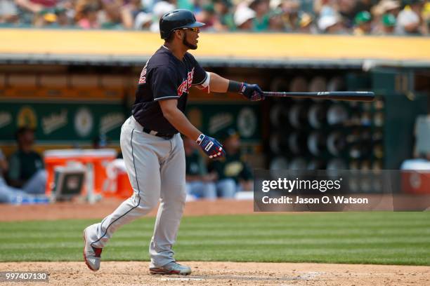 Edwin Encarnacion of the Cleveland Indians hits a home run against the Oakland Athletics during the seventh inning at the Oakland Coliseum on July 1,...