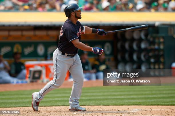 Edwin Encarnacion of the Cleveland Indians hits a home run against the Oakland Athletics during the seventh inning at the Oakland Coliseum on July 1,...