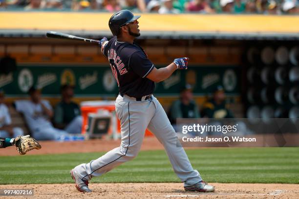 Edwin Encarnacion of the Cleveland Indians hits a home run against the Oakland Athletics during the seventh inning at the Oakland Coliseum on July 1,...