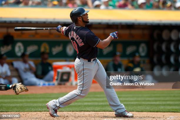 Edwin Encarnacion of the Cleveland Indians hits a home run against the Oakland Athletics during the seventh inning at the Oakland Coliseum on July 1,...