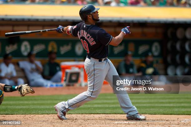 Edwin Encarnacion of the Cleveland Indians hits a home run against the Oakland Athletics during the seventh inning at the Oakland Coliseum on July 1,...