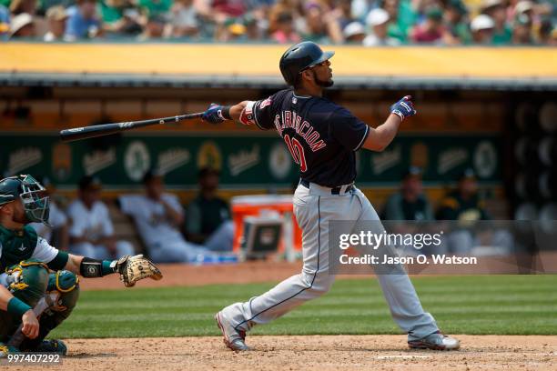 Edwin Encarnacion of the Cleveland Indians hits a home run against the Oakland Athletics during the seventh inning at the Oakland Coliseum on July 1,...