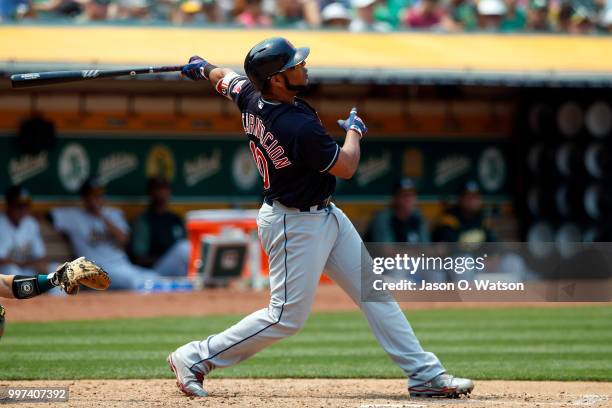 Edwin Encarnacion of the Cleveland Indians hits a home run against the Oakland Athletics during the seventh inning at the Oakland Coliseum on July 1,...