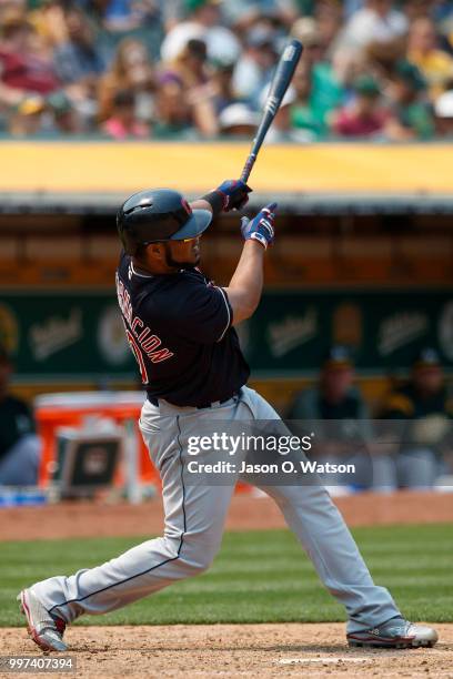 Edwin Encarnacion of the Cleveland Indians hits a home run against the Oakland Athletics during the seventh inning at the Oakland Coliseum on July 1,...