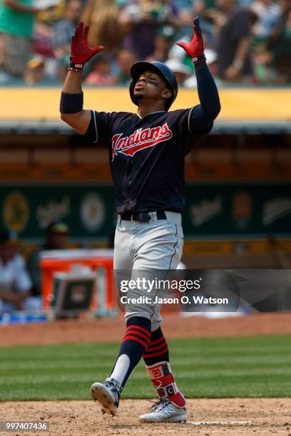 Francisco Lindor of the Cleveland Indians celebrates after hitting a home run against the Oakland Athletics during the seventh inning at the Oakland...