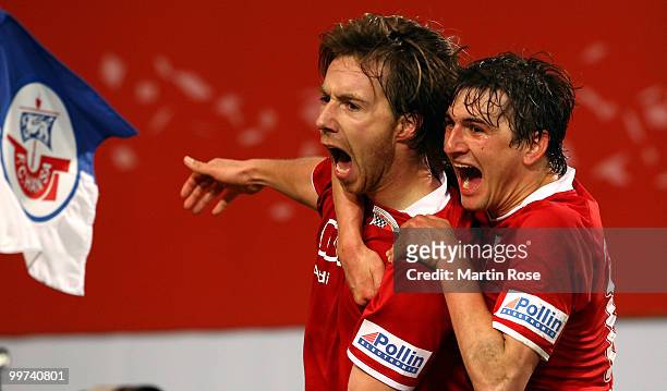 Fabian Gerber of Ingolstadt celebrates with team mate Andreas Buchner after he scores his team's 2nd goal during the Second Bundesliga play off leg...