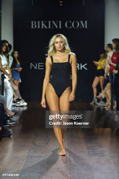 Model walks the runway for Bikini.com X newMARK Models during the Paraiso Fashion Fair at the Delano Hotel on July 12, 2018 in Miami, Florida.