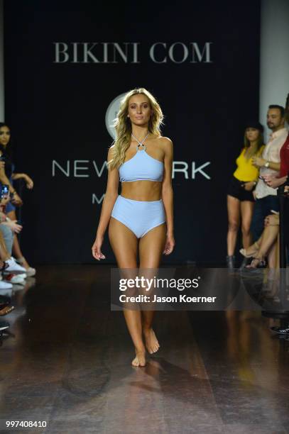 Model walks the runway for Bikini.com X newMARK Models during the Paraiso Fashion Fair at the Delano Hotel on July 12, 2018 in Miami, Florida.