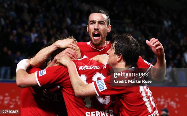 Malte Metzelder of Ingolstadt celebrates with his team mate his team's 2nd goal the Second Bundesliga play off leg two match between Hansa Rostock...