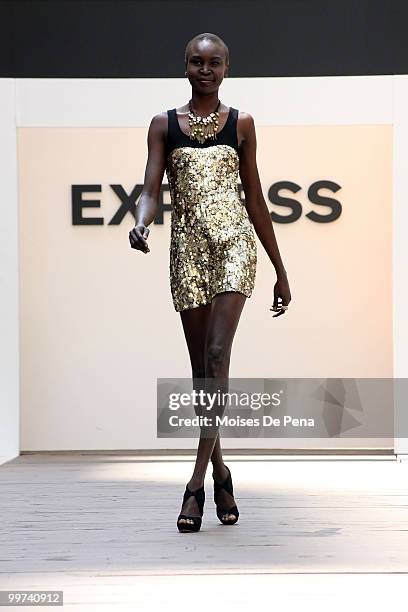 Model Alek Wek walks the catwalk during the Express 30th Anniversary Celebration Fashion Show outside of the New York Stock Exchange on May 14, 2010...