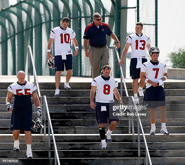 Quarterbacks Matt Schaub, John David Booty, Dan Orlovsky,Tyler Sheehan and center Chris Myers walk from Reliant Stadium to the practice facility for...