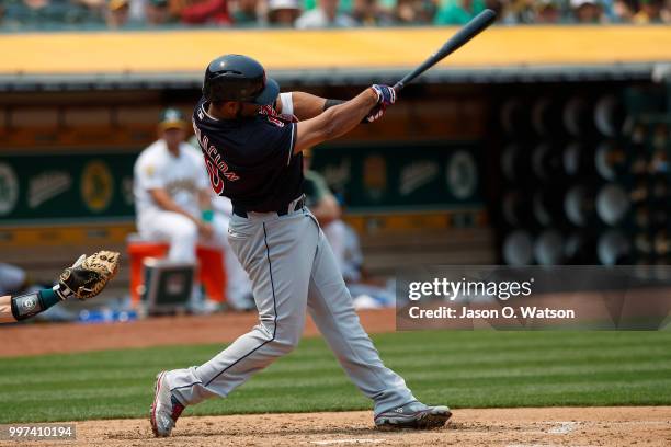 Edwin Encarnacion of the Cleveland Indians at bat against the Oakland Athletics during the fifth inning at the Oakland Coliseum on July 1, 2018 in...