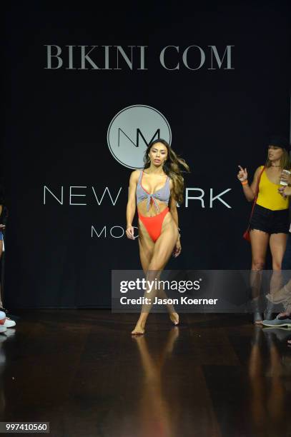 Model walks the runway for Bikini.com X newMARK Models during the Paraiso Fashion Fair at the Delano Hotel on July 12, 2018 in Miami, Florida.