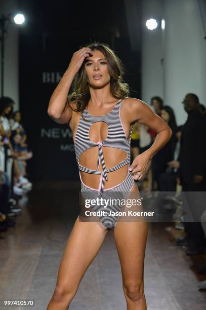 Model walks the runway for Bikini.com X newMARK Models during the Paraiso Fashion Fair at the Delano Hotel on July 12, 2018 in Miami, Florida.