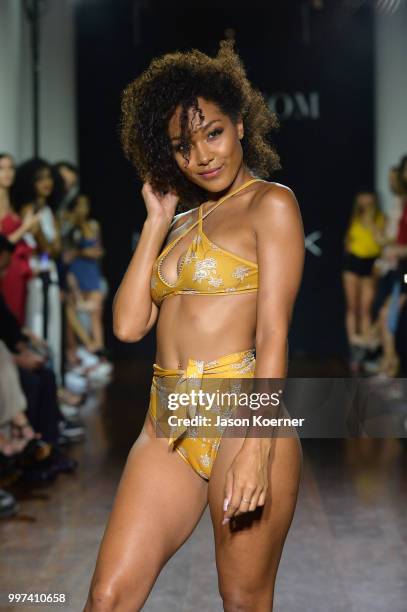 Model walks the runway for Bikini.com X newMARK Models during the Paraiso Fashion Fair at the Delano Hotel on July 12, 2018 in Miami, Florida.