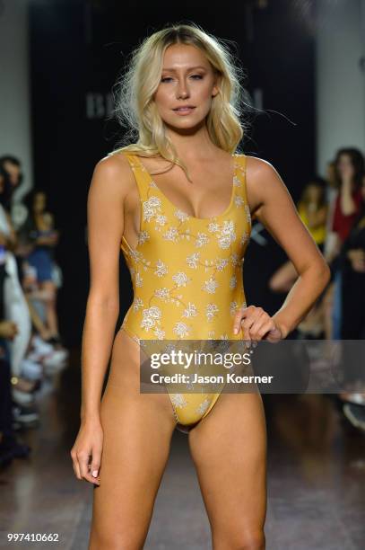 Model walks the runway for Bikini.com X newMARK Models during the Paraiso Fashion Fair at the Delano Hotel on July 12, 2018 in Miami, Florida.