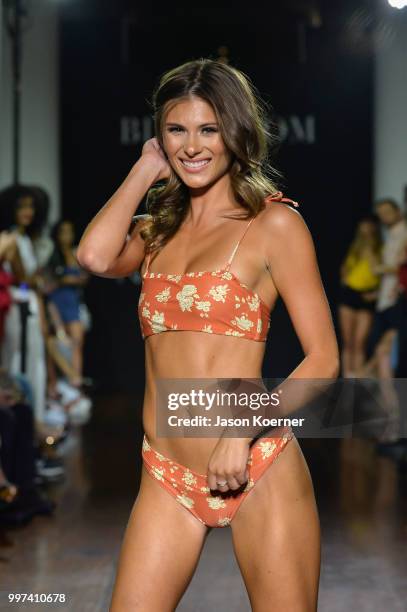 Model walks the runway for Bikini.com X newMARK Models during the Paraiso Fashion Fair at the Delano Hotel on July 12, 2018 in Miami, Florida.