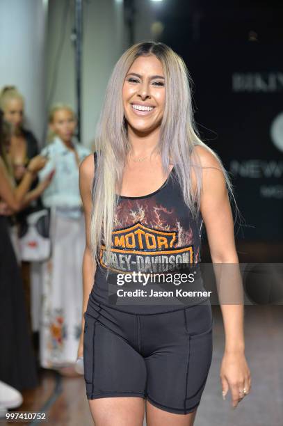 Kim Viera performs on the runway for Bikini.com X newMARK Models during the Paraiso Fashion Fair at the Delano Hotel on July 12, 2018 in Miami,...