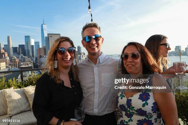 Emily Meehan, Christian Trimmer and Dina Sherman during the Melissa de la Cruz And Michael Johnston Summer Soiree at Azul On the Rooftop at Hotel...