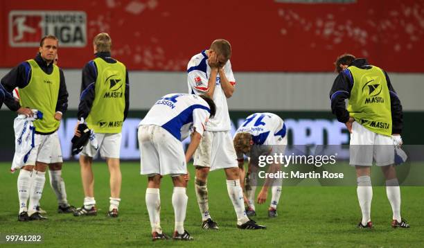 Players of Rostock look dejected after the Second Bundesliga play off leg two match between Hansa Rostock and FC Ingolstadt 04 at DKB Arena on May...