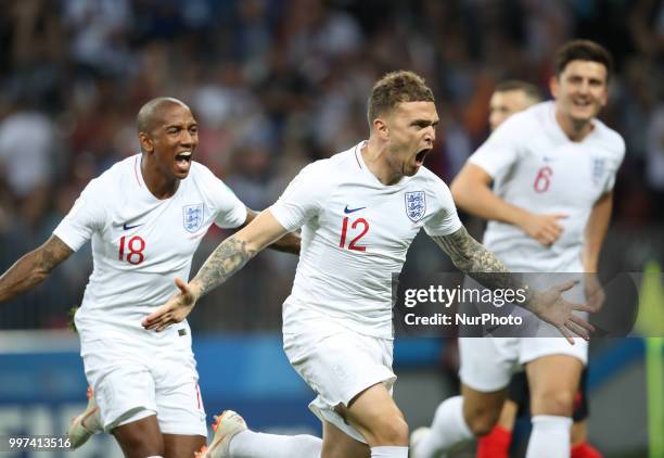 Kieran Trippier of England celebrates after his goal with Ashley Young during the 2018 FIFA World Cup Russia Semi Final match between England and...