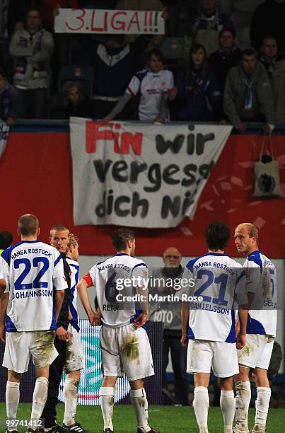 Players of Rostock look dejected after the Second Bundesliga play off leg two match between Hansa Rostock and FC Ingolstadt 04 at DKB Arena on May...