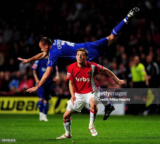 Scott Cuthbert of Swindon flies over David Mooney of Charlton during the Coca-Cola League One Playoff Semi Final 2nd Leg between Charlton Athletic...