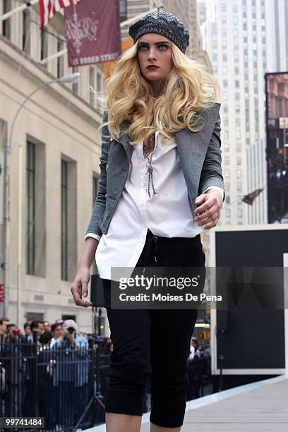 Model walks the catwalk during the Express 30th Anniversary Celebration Fashion Show outside of the New York Stock Exchange on May 14, 2010 in New...