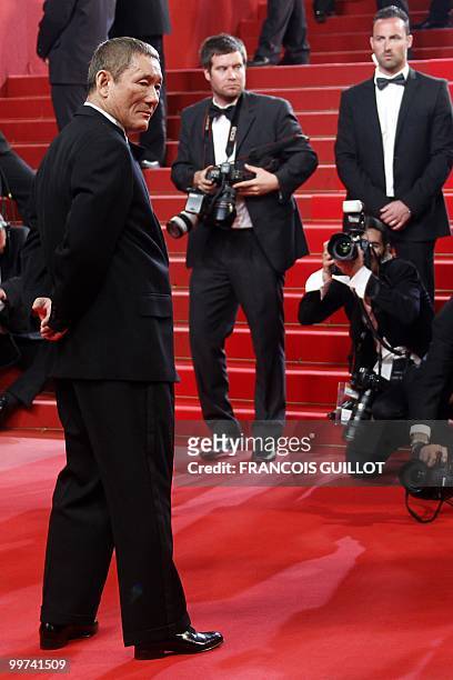 Japanese actor and director Takeshi Kitano arrives for the screening of "Outrage" presented in competition at the 63rd Cannes Film Festival on May...