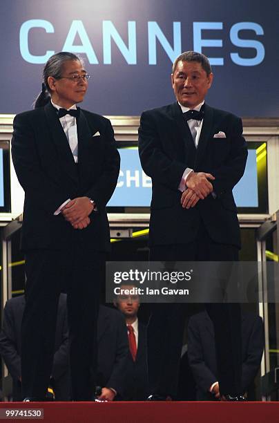 Director Takeshi Kitano and actor Masayuki Mori attend "Outrage" Premiere at the Palais des Festivals during the 63rd Annual Cannes Film Festival on...