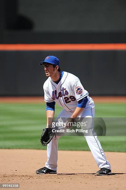 Ike Davis of the New York Mets fields during the extra inning game against the San Francisco Giants at Citi Field in Flushing, New York on May 8,...