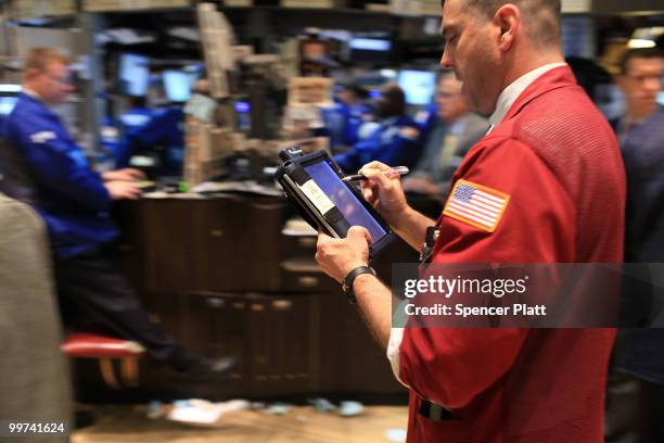 Traders work on the floor of the New York Stock Exchange on May 17, 2010 in New York, New York. Despite earlier loses, U.S. Stocks finished higher...