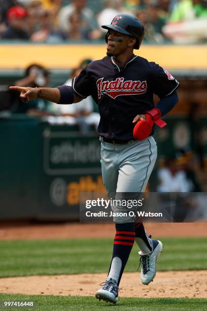 Francisco Lindor of the Cleveland Indians celebrates after scoring a run against the Oakland Athletics during the fifth inning at the Oakland...