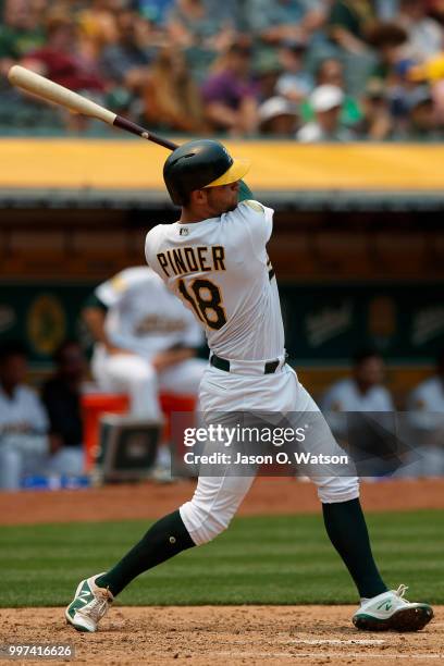 Chad Pinder of the Oakland Athletics at bat against the Cleveland Indians during the fourth inning at the Oakland Coliseum on July 1, 2018 in...